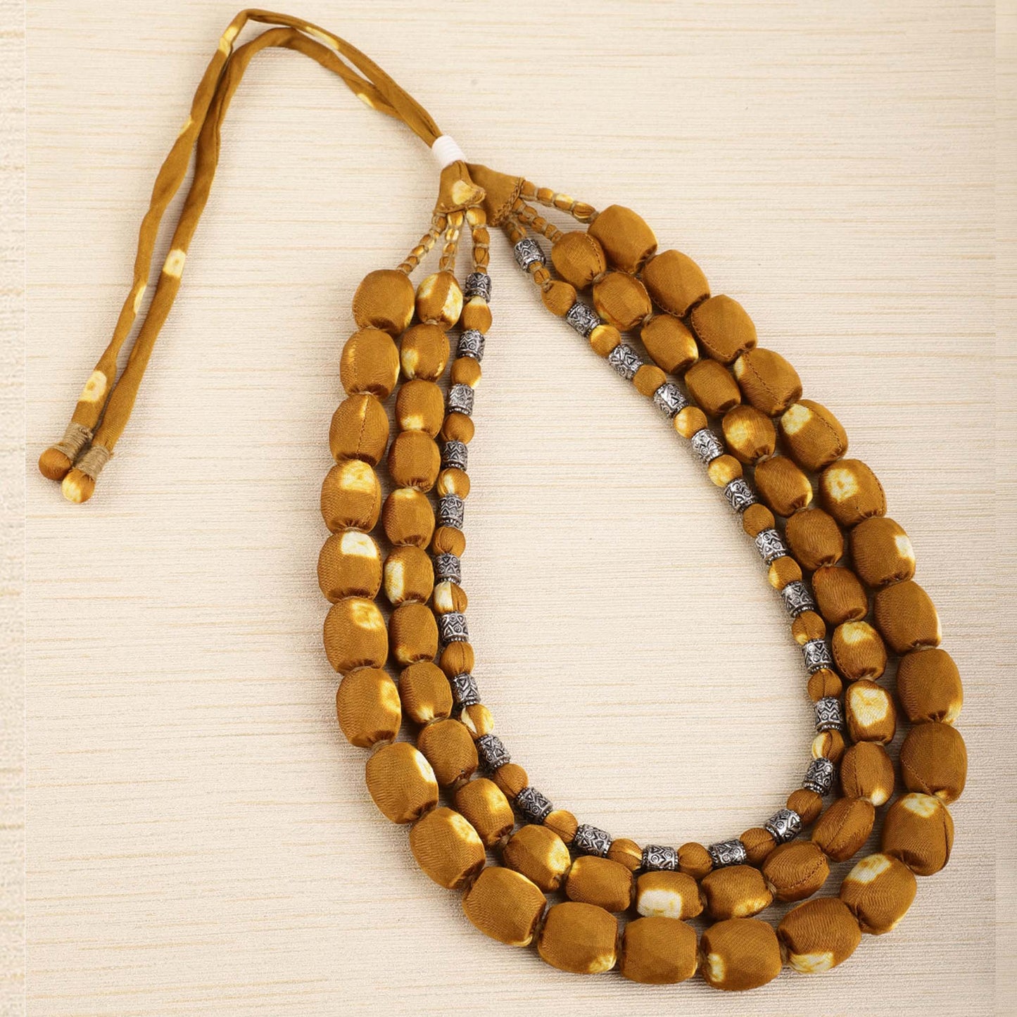 3 layer fabric beaded necklace in bandhni silk