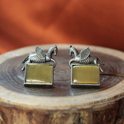 Silva Sutra yellow unicorn studs