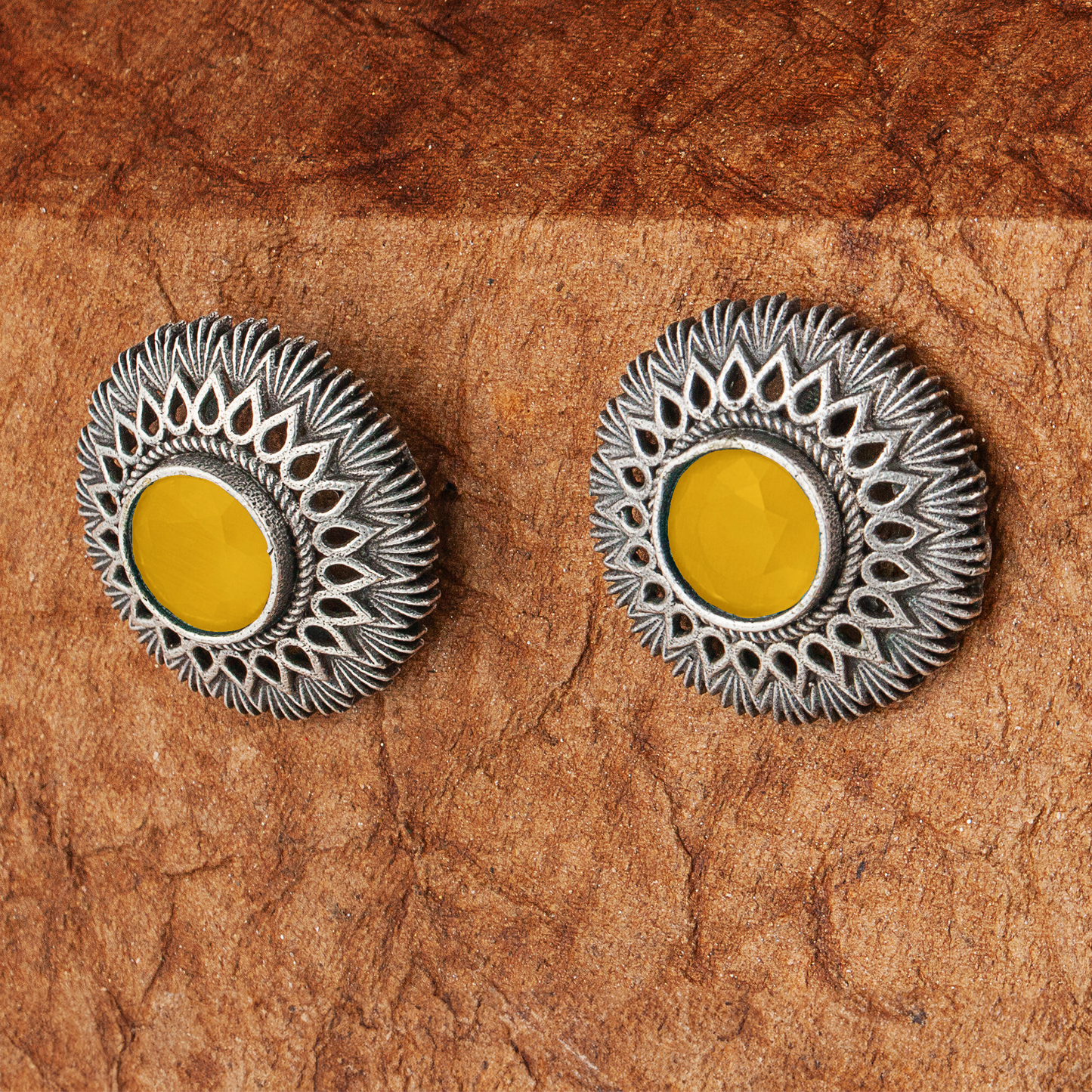 Silva Sutra yellow oxidised studs